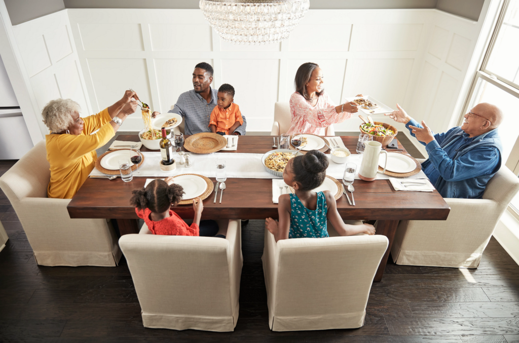 Family having breakfast at the dining table | Leaf Floor Covering